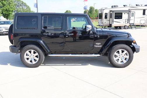 Black 2012 Jeep Wrangler Unlimited Sahara