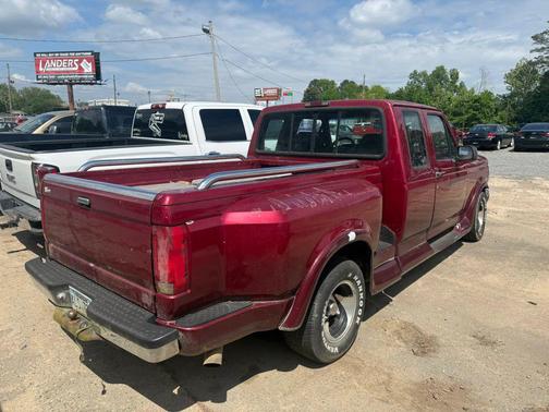 Red 1995 Ford F-150 Long Bed