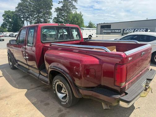 Red 1995 Ford F-150 Long Bed