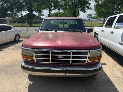 Red 1995 Ford F-150 Long Bed