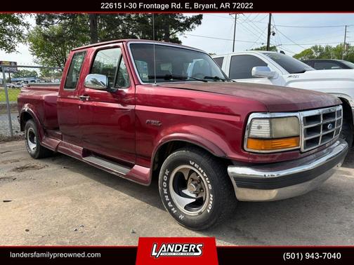 Red 1995 Ford F-150 Long Bed