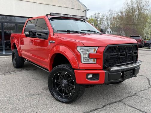 Red 2015 Ford F-150 Lariat