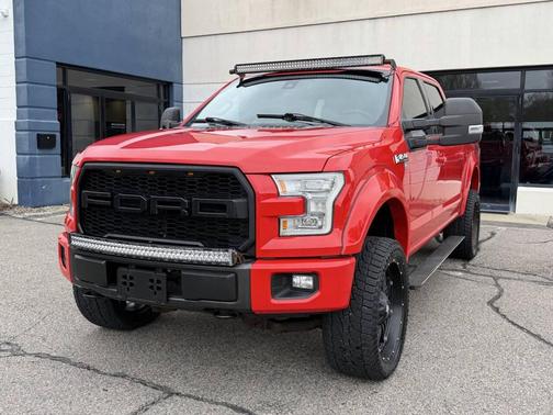 Red 2015 Ford F-150 Lariat