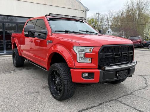 Red 2015 Ford F-150 Lariat