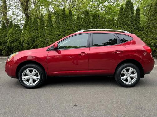Red 2008 Nissan Rogue SL