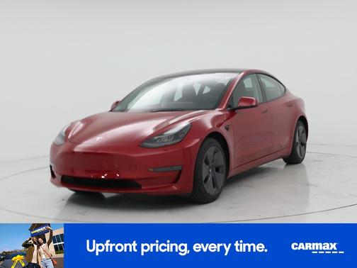 Red 2023 Tesla Model 3