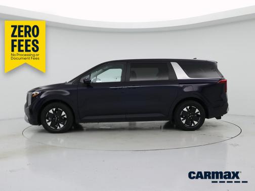 Black 2025 Kia Carnival Hybrid LXS
