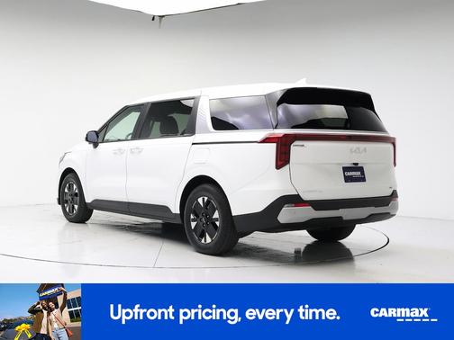 White 2025 Kia Carnival Hybrid LXS