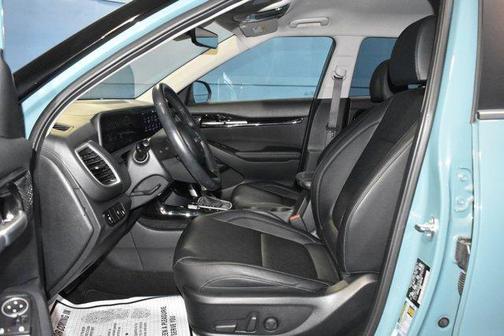 Blue 2025 Kia Seltos EX