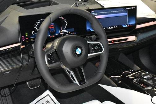 Black Sapphire Metallic 2027 BMW 540 i xDrive