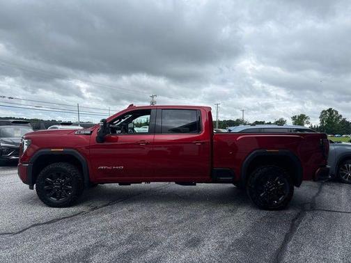 Volcanic Red Tintcoat 2026 GMC Sierra 2500 AT4