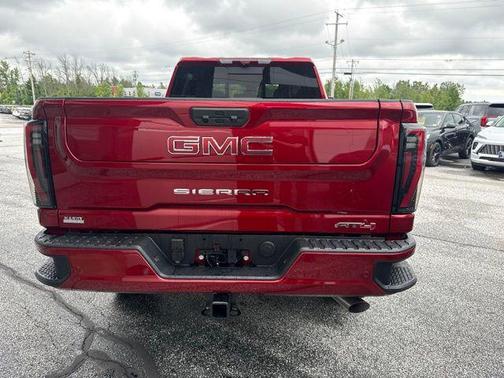 Volcanic Red Tintcoat 2026 GMC Sierra 2500 AT4