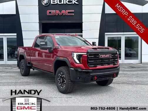 Volcanic Red Tintcoat 2026 GMC Sierra 2500 AT4X