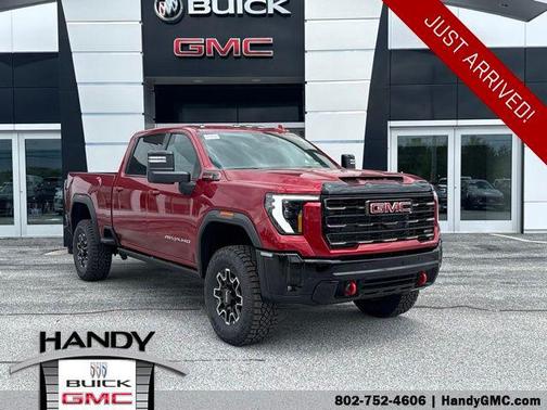 Volcanic Red Tintcoat 2026 GMC Sierra 2500 AT4X