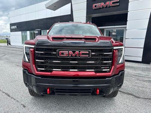 Volcanic Red Tintcoat 2026 GMC Sierra 2500 AT4X