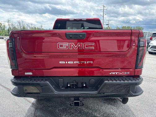 Volcanic Red Tintcoat 2026 GMC Sierra 2500 AT4X