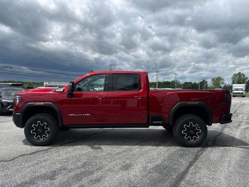 Volcanic Red Tintcoat 2026 GMC Sierra 2500 AT4X