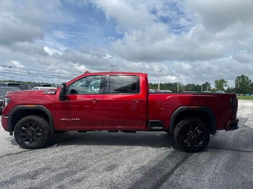 Volcanic Red Tintcoat 2026 GMC Sierra 3500 AT4