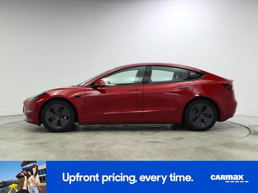 Red 2023 Tesla Model 3
