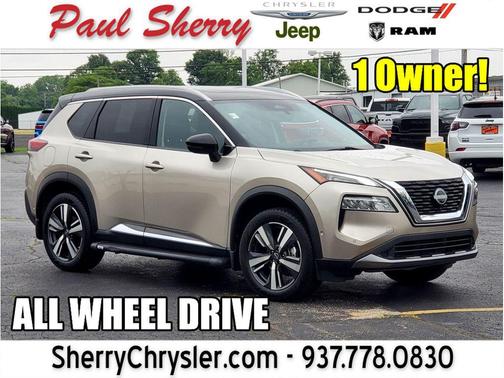 Champagne Silver Metallic/Super Black 2023 Nissan Rogue SL