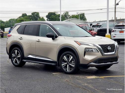 Champagne Silver Metallic/Super Black 2023 Nissan Rogue SL