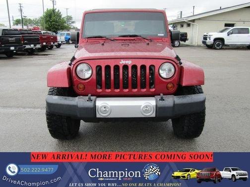 Maroon 2013 Jeep Wrangler Unlimited Sahara