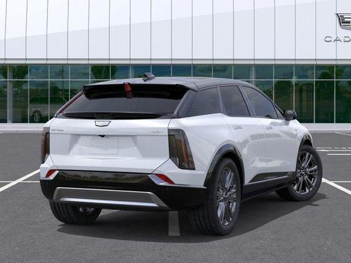 Vibrant White Tricoat 2026 Cadillac OPTIQ Premium Sport