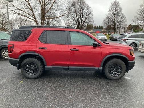 Radiant Red 2026 Honda Passport TrailSport Blackout