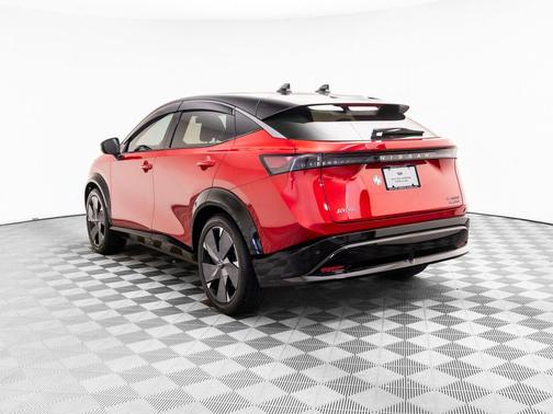 Passion Red Tricoat/Black Diamond Pearl 2023 Nissan ARIYA PLATINUM+