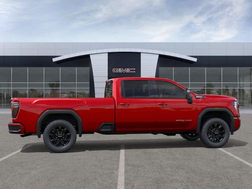 Volcanic Red Tintcoat 2026 GMC Sierra 2500 AT4