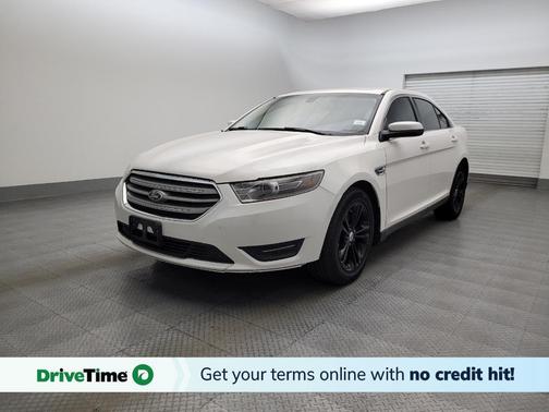 White 2016 Ford Taurus SEL