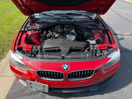 Red 2016 BMW 320 i