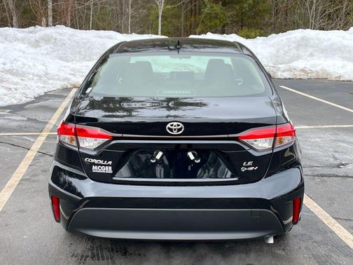 Midnight Black Metallic 2026 Toyota Corolla Hybrid LE