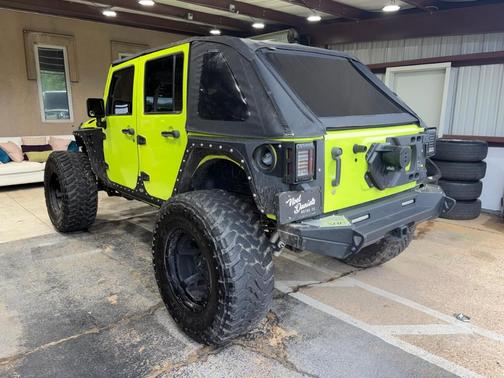 Green 2016 Jeep Wrangler Unlimited Sport