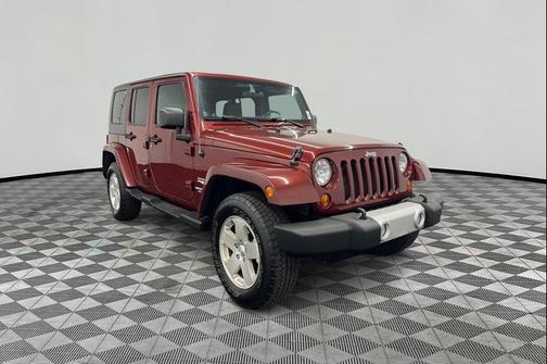 Red Rock Crystal Pearl 2010 Jeep Wrangler Unlimited Sahara