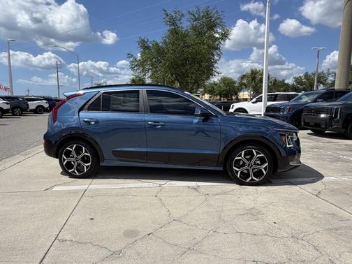 Mineral Blue 2023 Kia Niro SX Touring