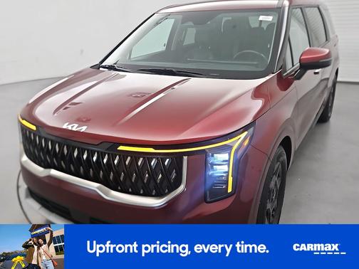 Red 2025 Kia Carnival LX