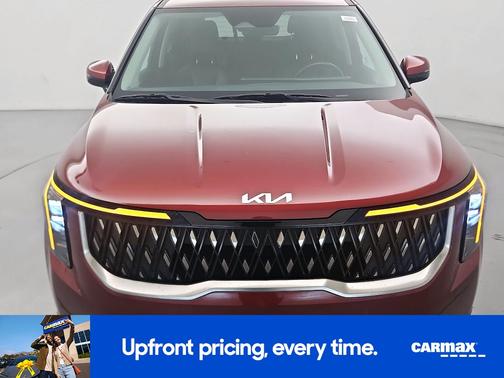 Red 2025 Kia Carnival LX
