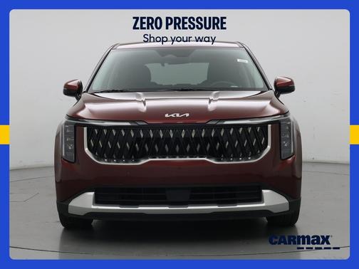 Red 2025 Kia Carnival LX