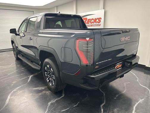 Deep Ocean Metallic 2026 GMC Sierra EV Standard Range Elevation