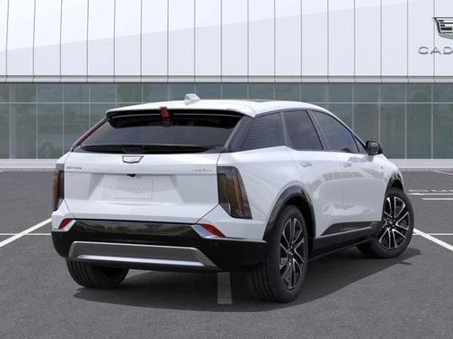 Vibrant White 2026 Cadillac OPTIQ Premium Sport