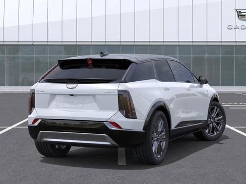 Vibrant White 2026 Cadillac OPTIQ Premium Sport