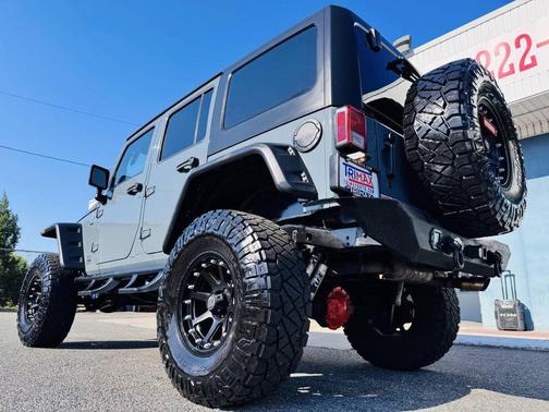 Gray 2015 Jeep Wrangler Unlimited Sahara