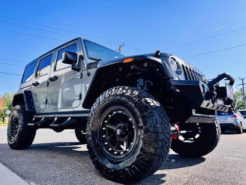 Gray 2015 Jeep Wrangler Unlimited Sahara