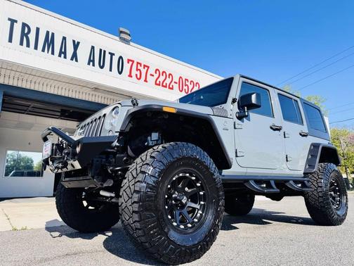 Gray 2015 Jeep Wrangler Unlimited Sahara SUV