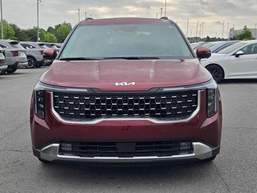 Red 2026 Kia Carnival SX