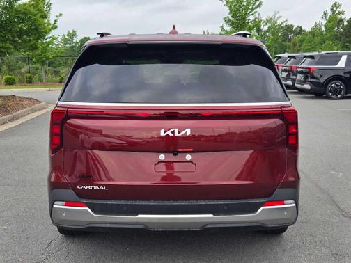 Red 2026 Kia Carnival SX
