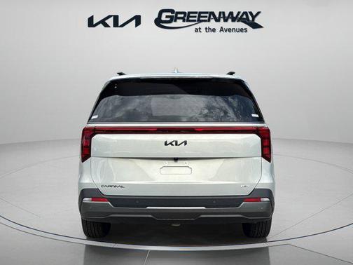 Ivory Silver 2026 Kia Carnival Hybrid SX