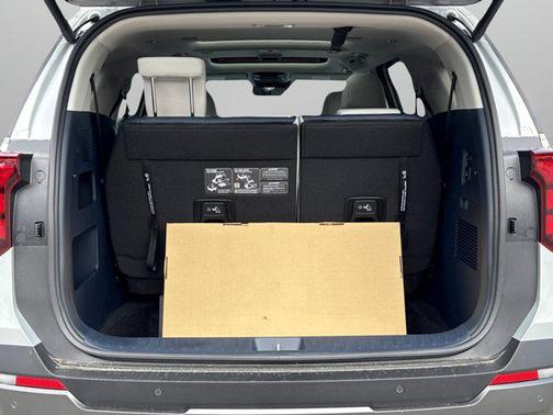 Ivory Silver 2026 Kia Carnival Hybrid SX