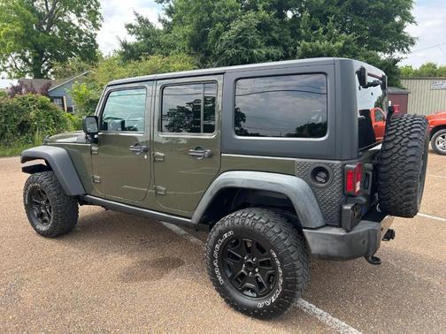 Dark Green 2016 Jeep Wrangler Unlimited Sport